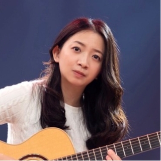 吉他二：林美均